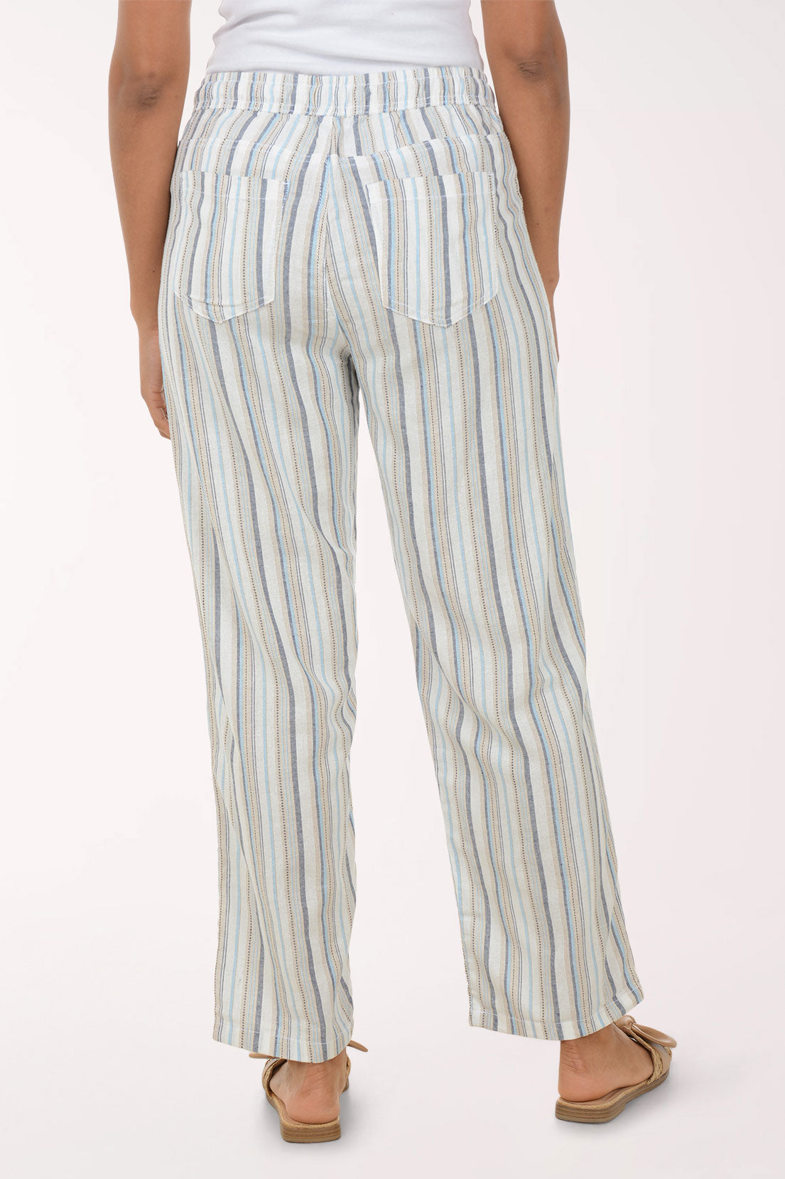 Person wearing striped pants on a white background