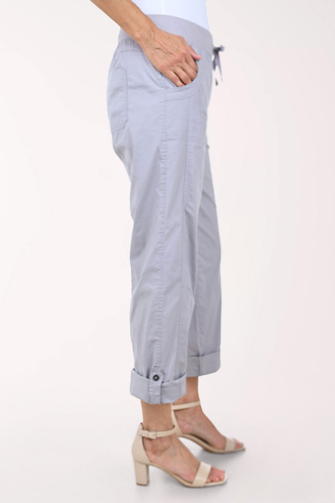 Woman wearing cropped grey pants