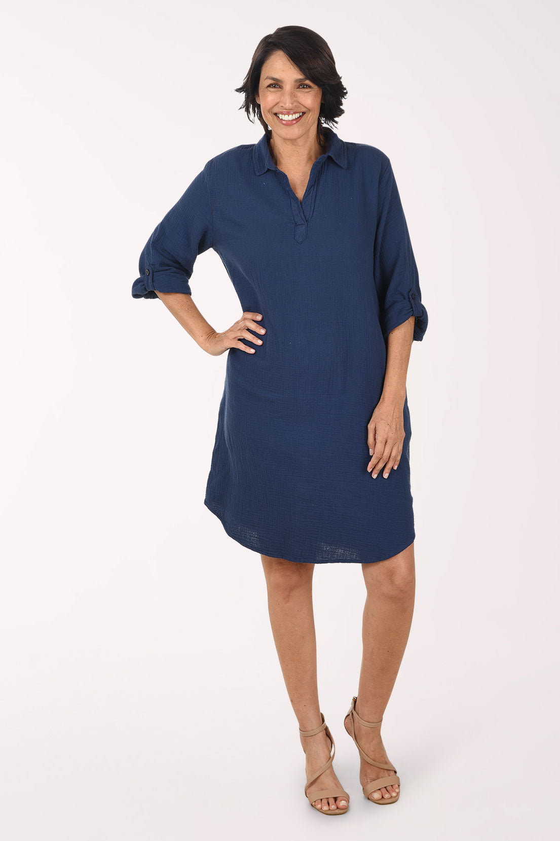 Woman wearing a blue dress on a white background