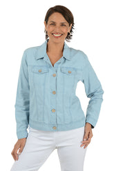 Woman wearing a light blue denim jacket on a white background.