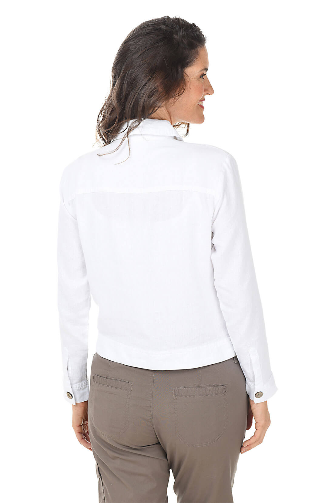 Woman wearing a white denim jacket with buttons on a white background. Back shot.