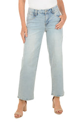 Light blue jeans worn by a person on a white background.