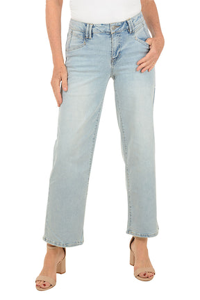Light blue jeans worn by a person on a white background.
