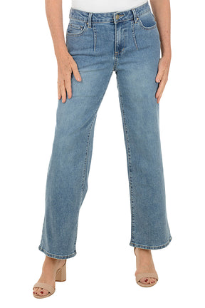 Light blue jeans worn by a person on a white background.