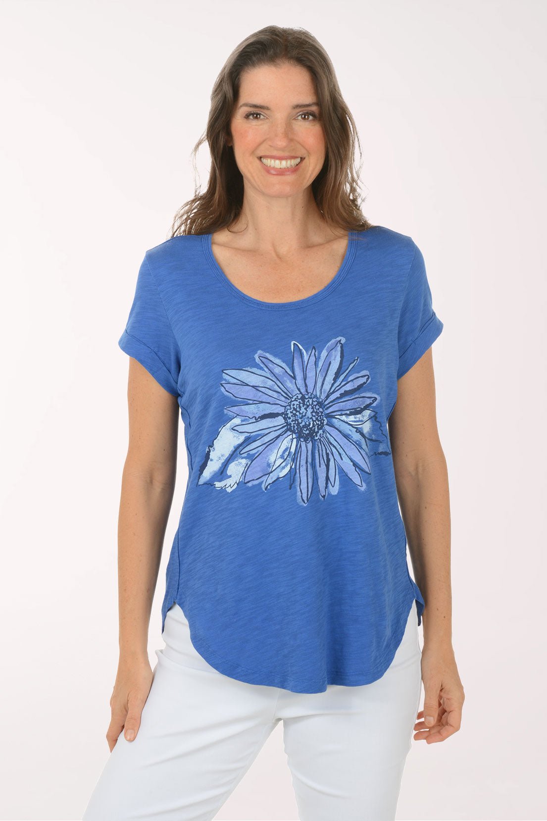 A woman wearing a short sleeve blue top.