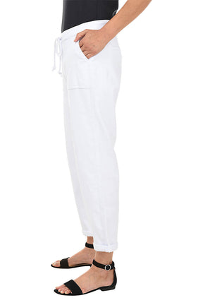 White pants worn by a person on a white background. Side shot.