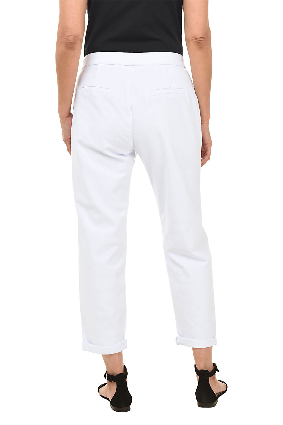White pants worn by a person on a white background. Back shot.