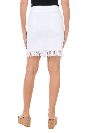White skirt with fringe hem worn by a person on a white background. Back shot.