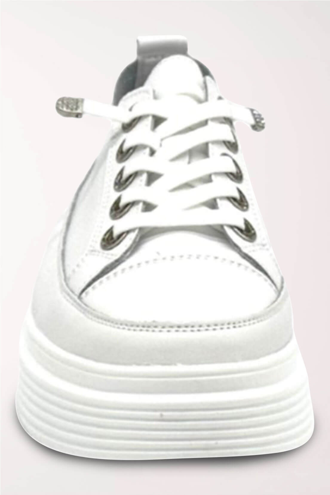 Front view of the white leather platform sneaker showing the elastic laces with rhinestone tips and the thick platform sole.