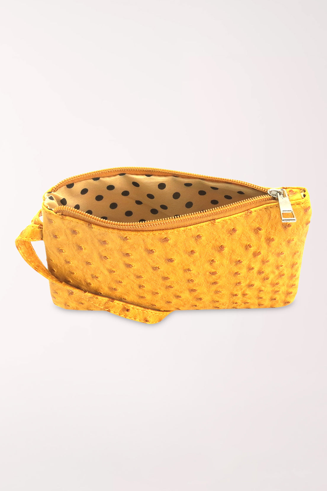 The mustard 22 Tote Ostrich Wristlet Pouch unzipped to show the tan lining with brown polka dots.