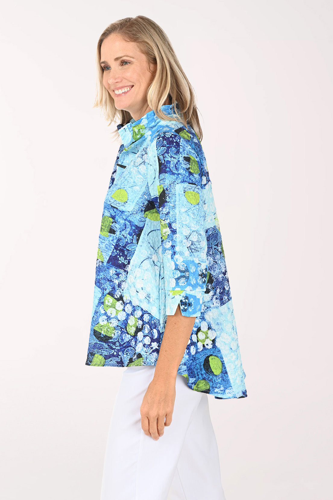 Woman wearing a blue and green button-down top
