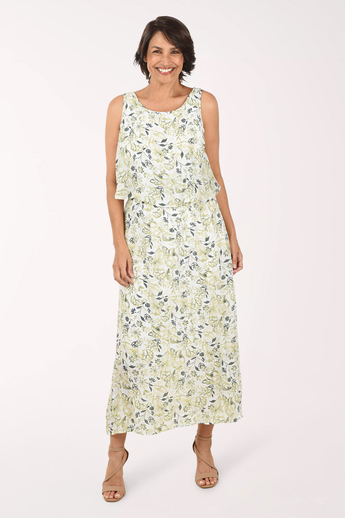 Woman wearing a floral dress on a white background