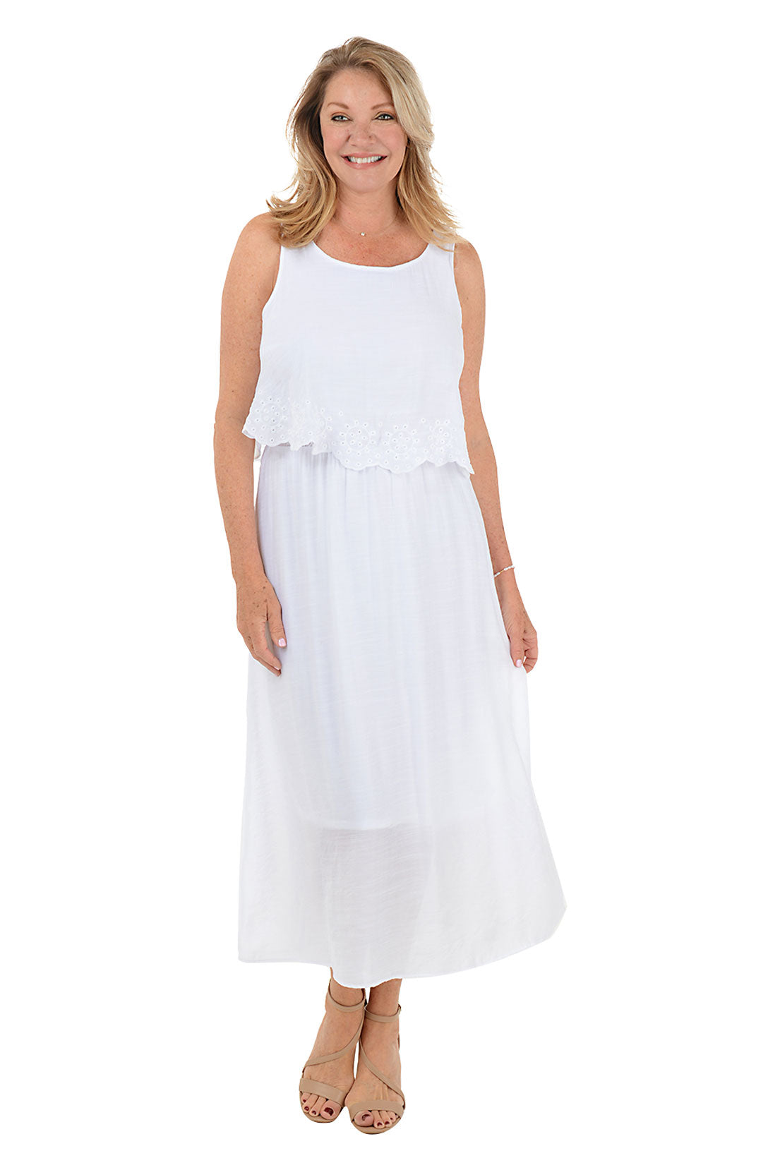 Woman wearing a white sleeveless dress on a white background