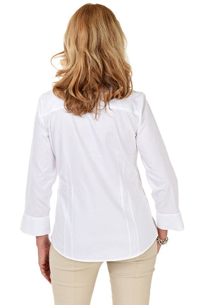 Back shot of a woman in a white classic Foxcroft wrinkle-free non-iron shirt for women, tailored fit with crisp cotton blend.