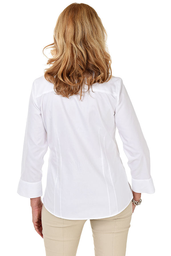 Back shot of a woman in a white classic Foxcroft wrinkle-free non-iron shirt for women, tailored fit with crisp cotton blend.