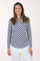 Woman wearing a blue and white patterned shirt on a white background