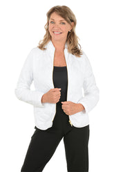 A woman wearing a white quilted puffer jacket.