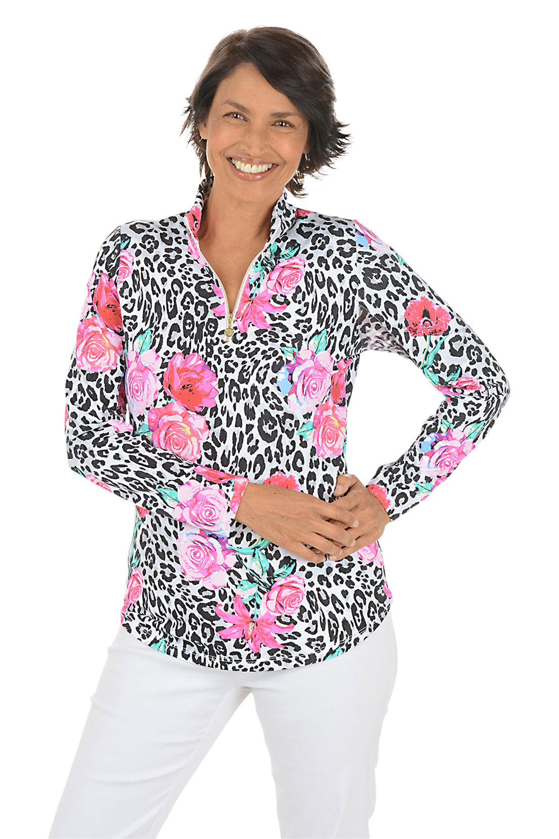 Woman wearing a long-sleeve shirt with a leopard print and floral pattern on a white background