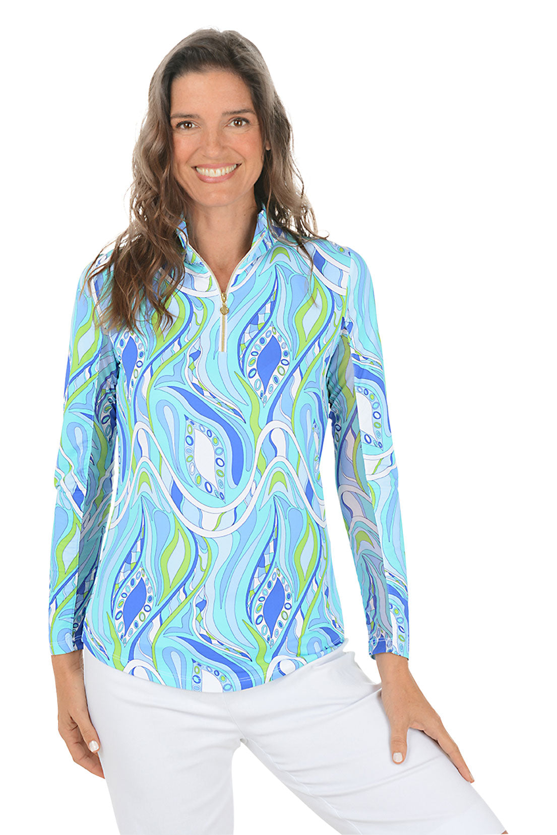 Woman wearing a colorful patterned shirt with a white background