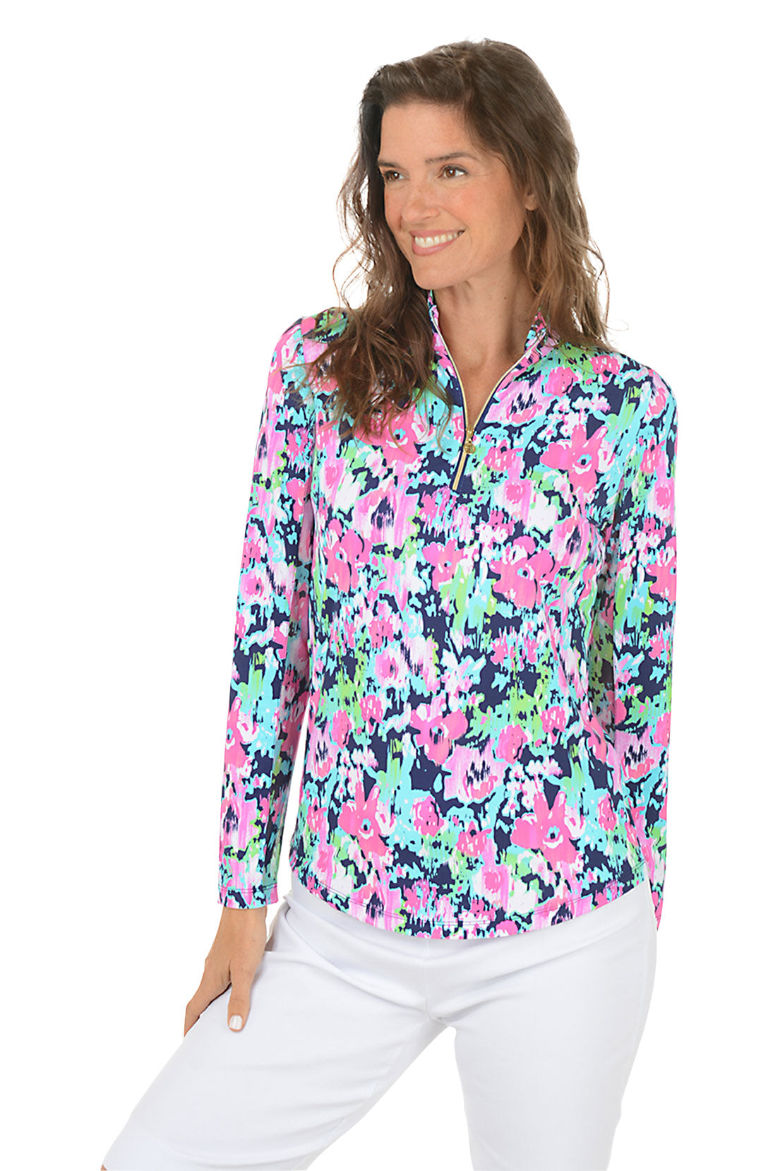 Woman wearing a colorful floral blouse with a white background