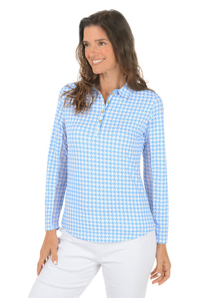 Woman wearing a blue checkered shirt on a white background. Second front shot.