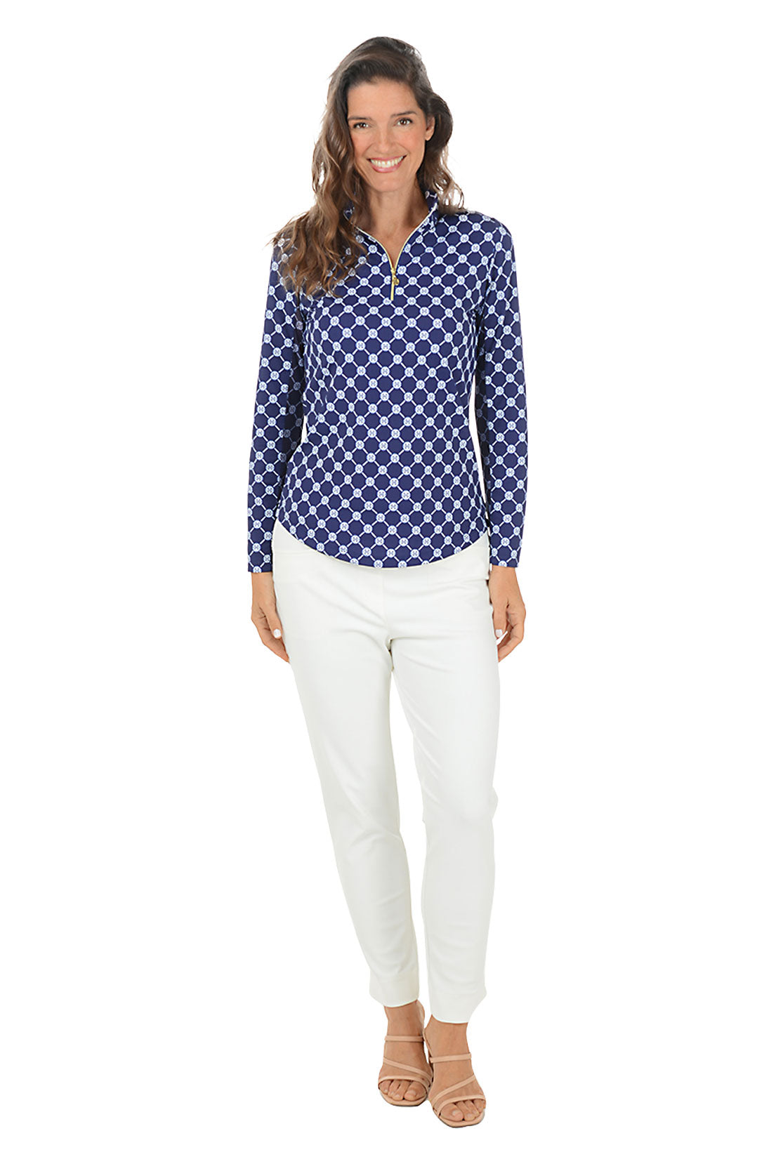 Woman wearing a blue checkered shirt and white pants on a white background