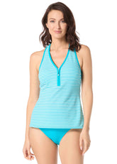 Woman wearing a blue striped tankini top on a white background