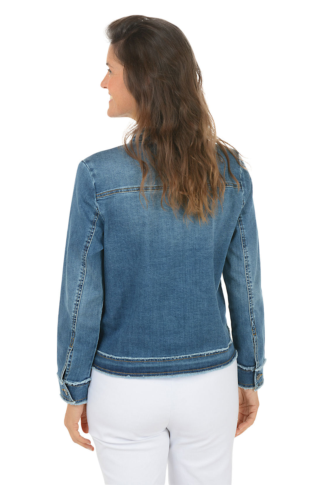 Woman wearing a blue denim jacket on a white background. Back shot.