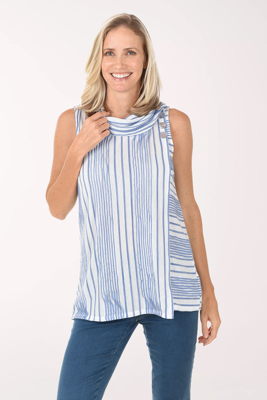 Woman wearing a blue and white striped sleeveless top on a white background