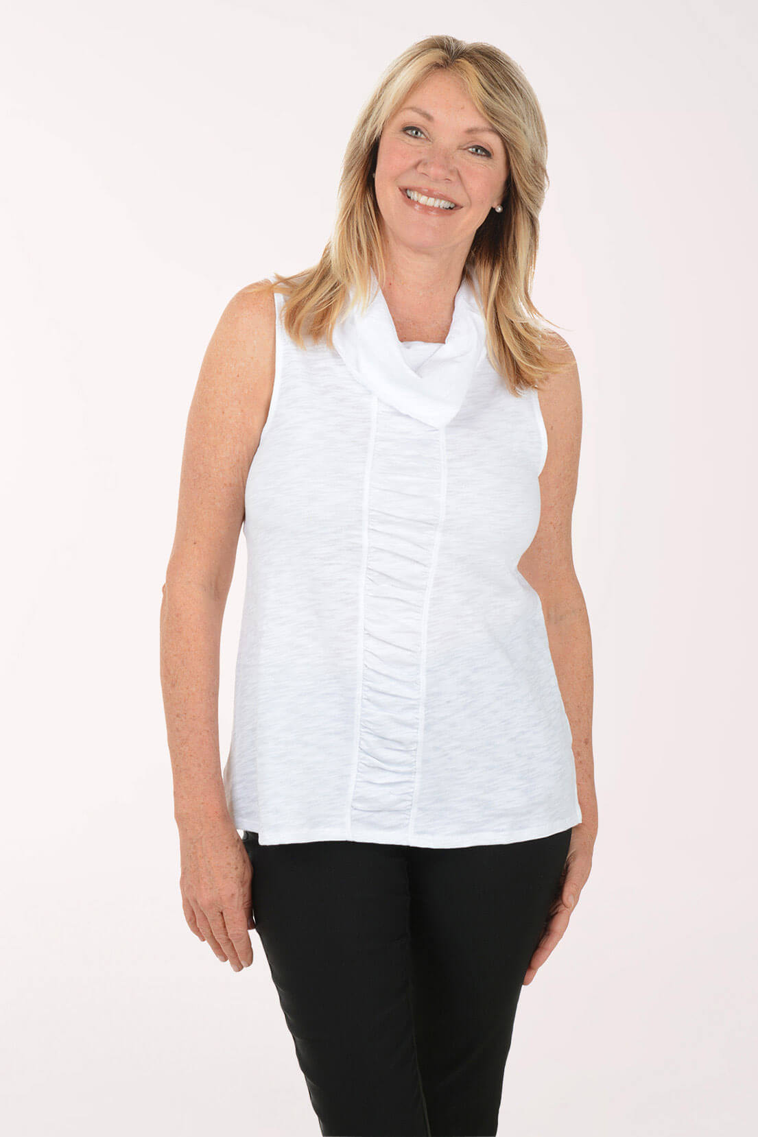 Woman wearing a white sleeveless top with a cowl neckline on a white background