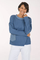 Woman wearing a blue sweater