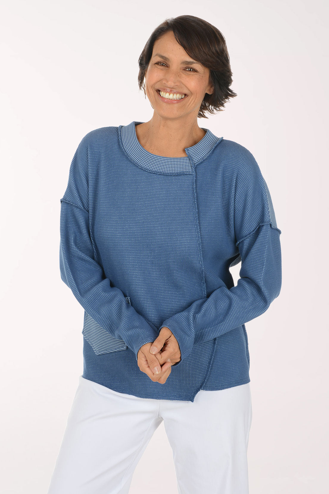 Woman wearing a blue sweater
