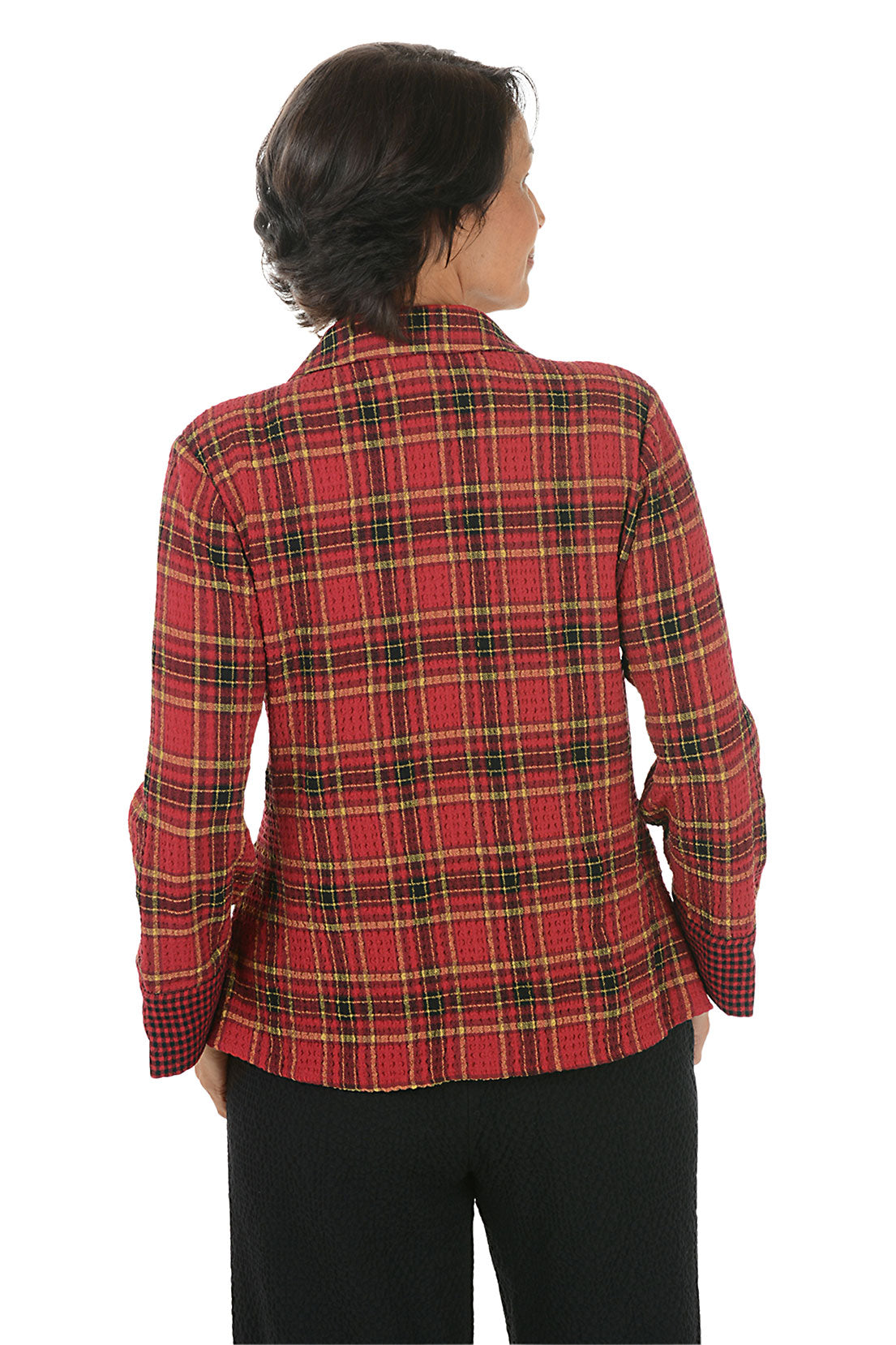 Woman wearing a red plaid shirt on a white background. Back shot.