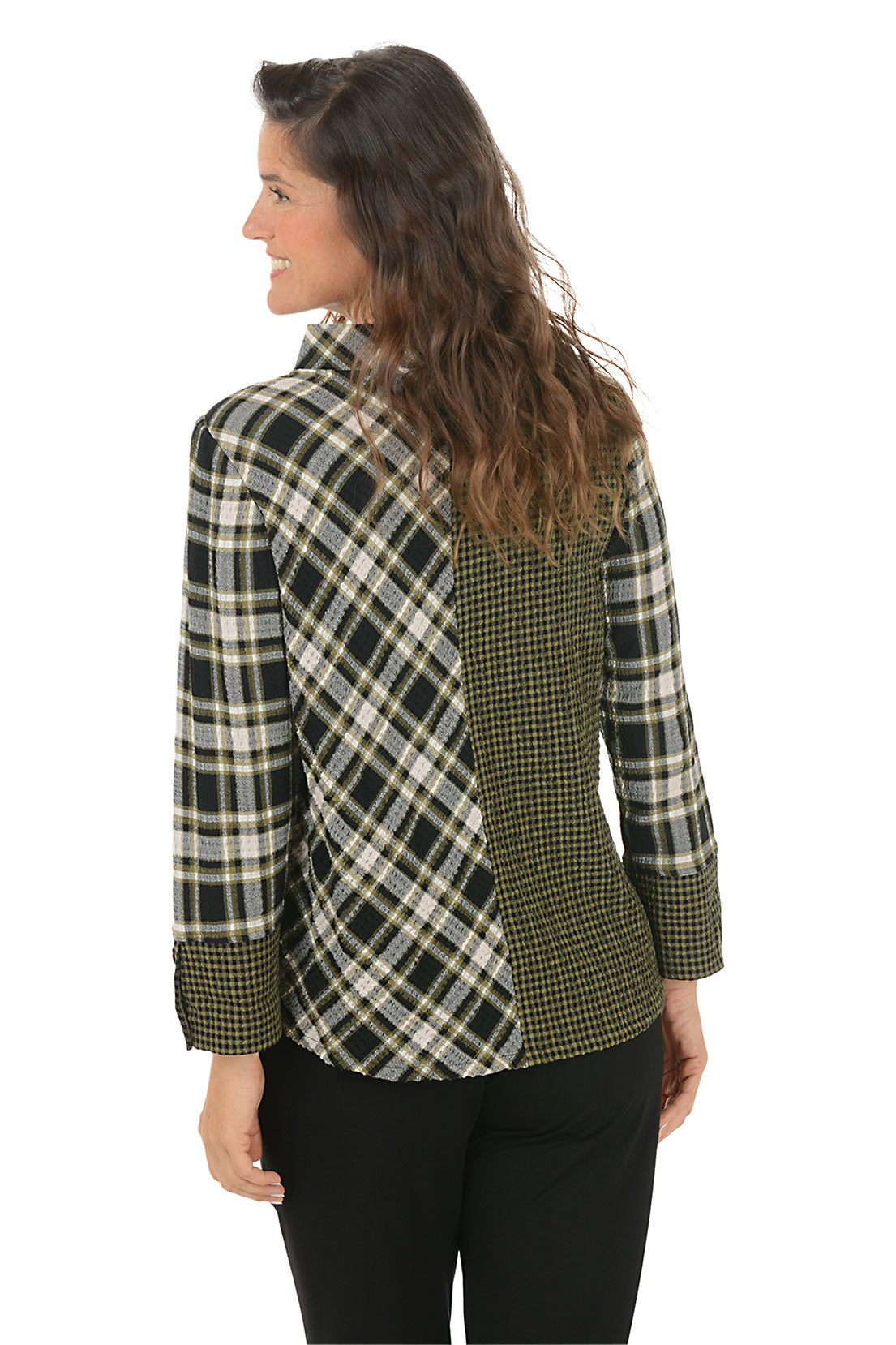 Woman wearing a green and black contrasting plaid shirt on a white background. Back shot.