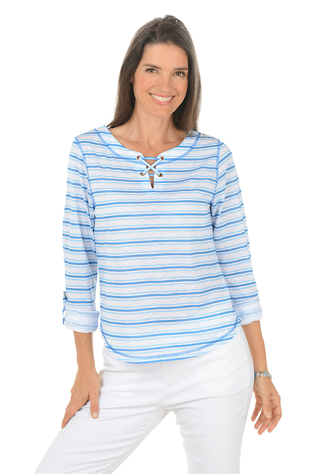 Woman wearing a blue and white striped shirt with a lace-up front, standing against a white background.