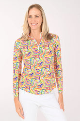 Woman wearing a colorful patterned shirt on a white background