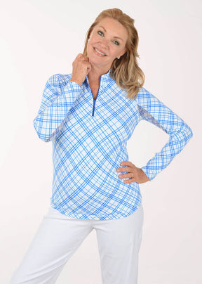 Woman wearing a blue plaid shirt on a white background