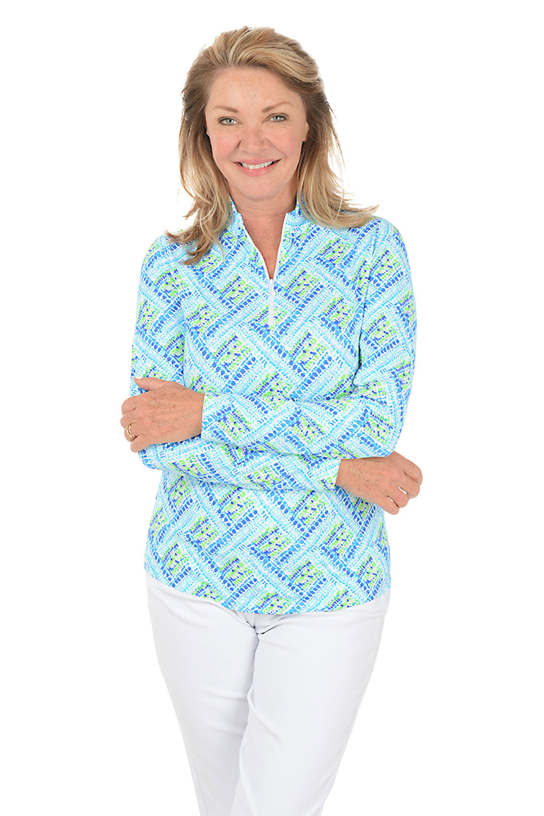 Woman wearing a blue patterned long-sleeve shirt on a white background. Second front shot.