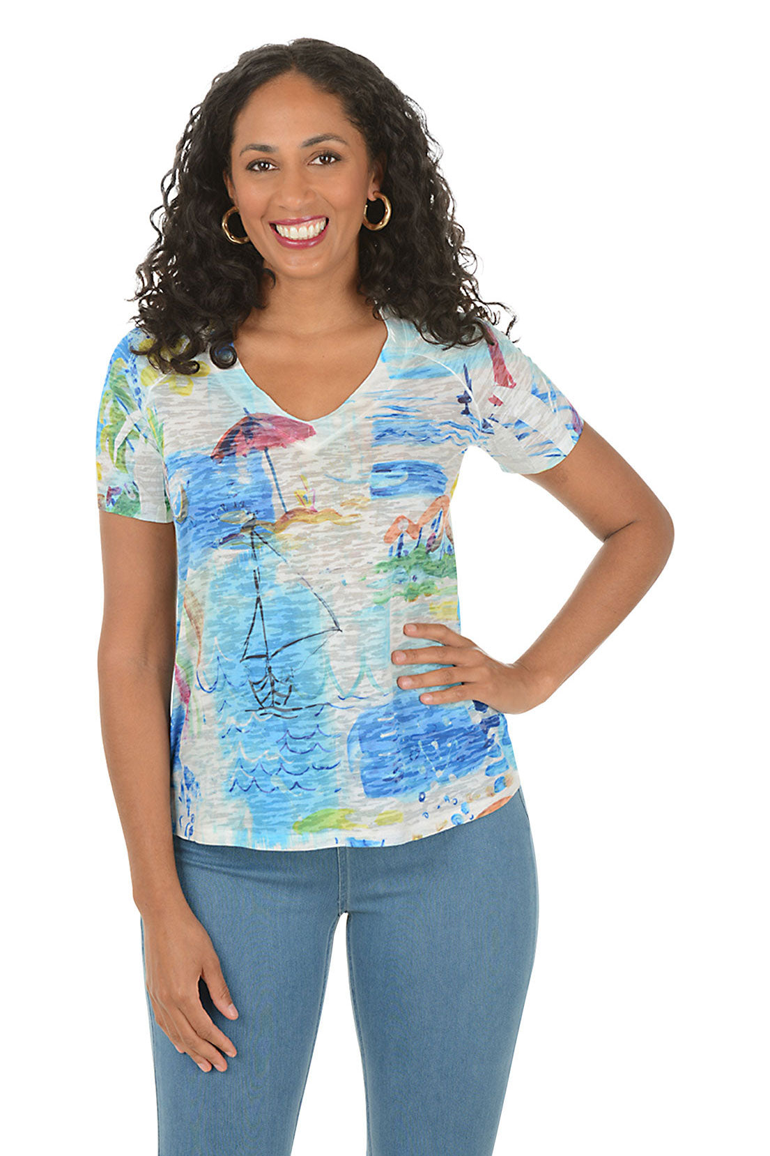 Woman wearing a colorful patterned shirt with a white background.