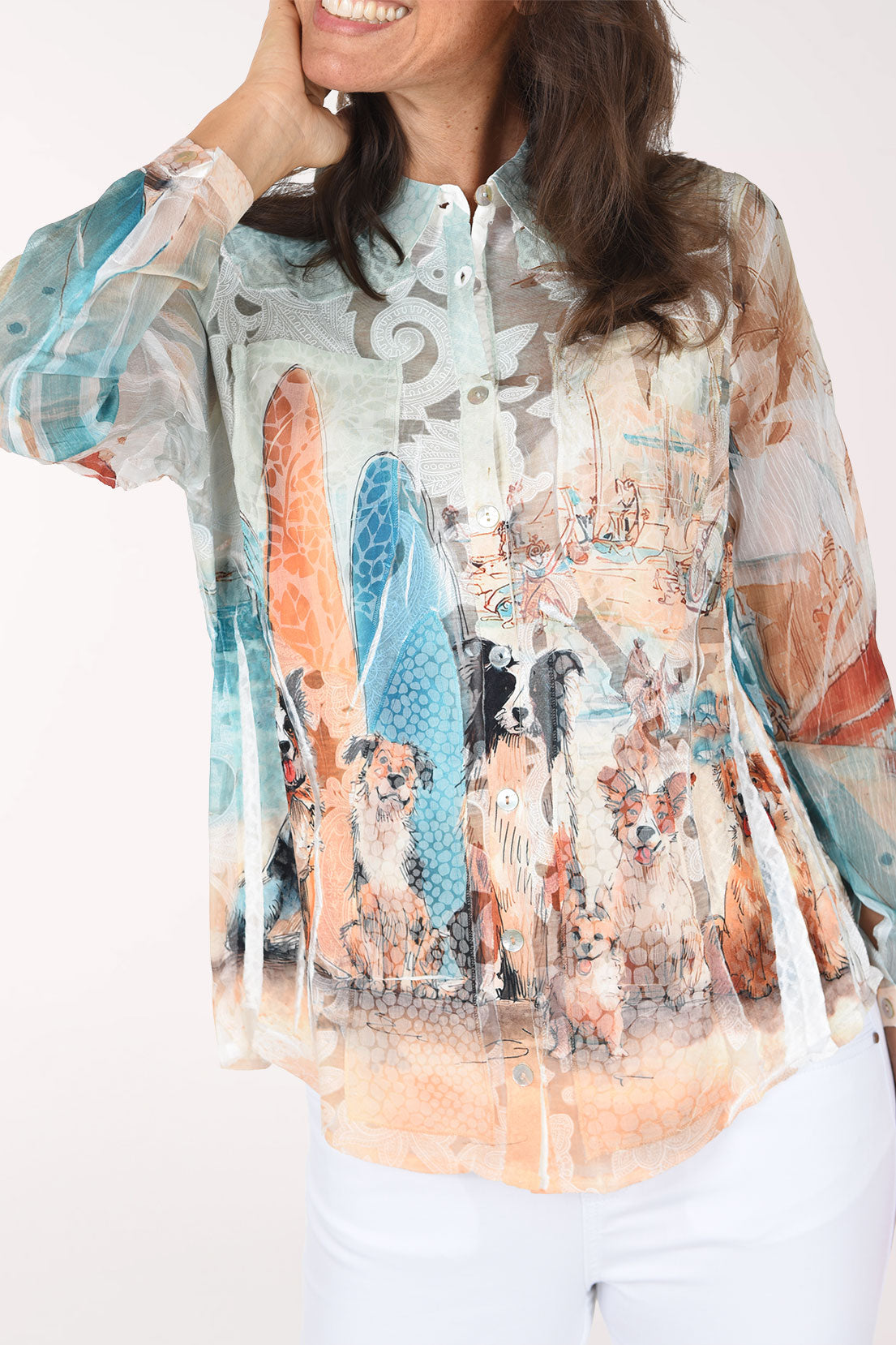 Close front view showing the coral and aqua surfboards, beach dogs, chest pockets and buttons