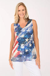 Woman wearing a sleeveless top with a colorful American flag design on a white background