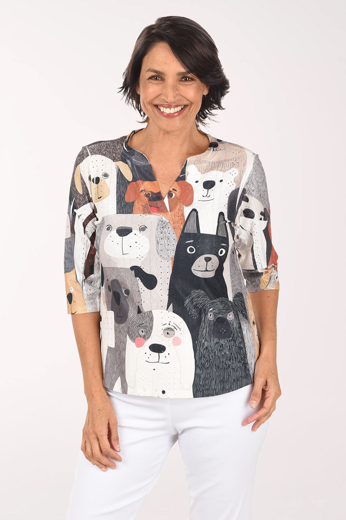 Woman wearing a shirt with animal prints on a white background