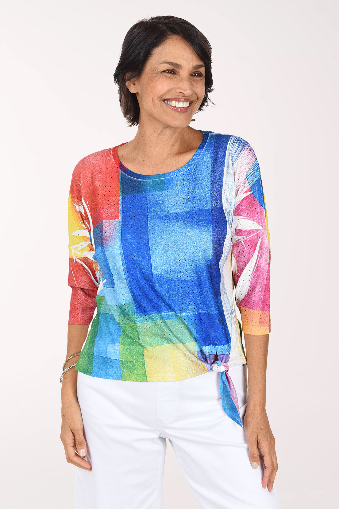 Front view showing the tie at the side of the hem and the 3/4 dolman sleeves