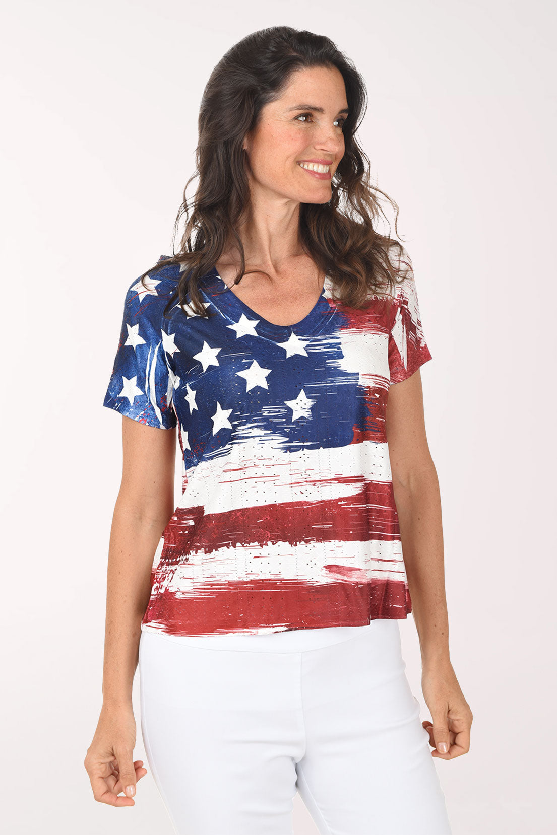 Woman wearing a t-shirt with an American flag design on a white background