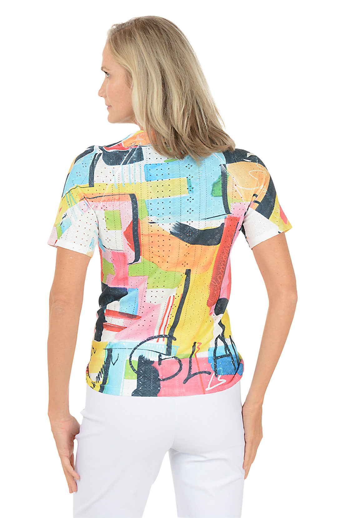 Woman wearing a colorful abstract patterned top on a white background. Back shot.
