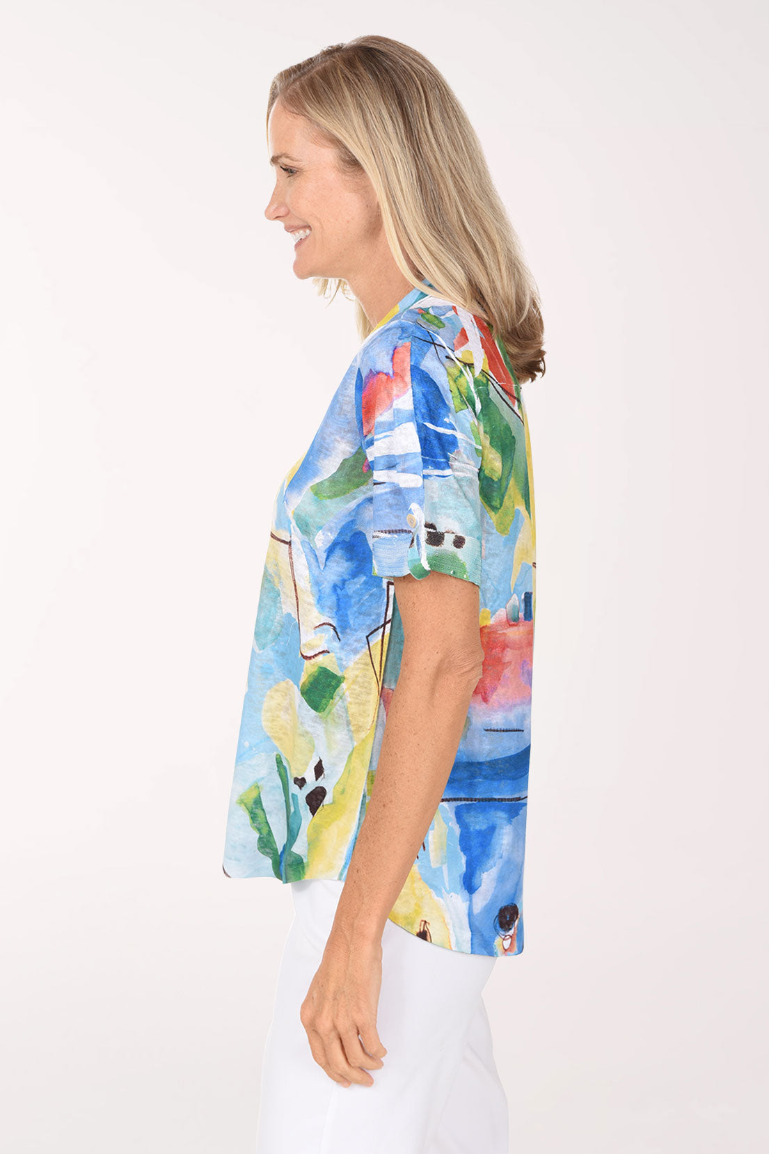Side view of the Colorful Abstract Sequin Accented Polo Top showing the cuffed short sleeve and high-low hem