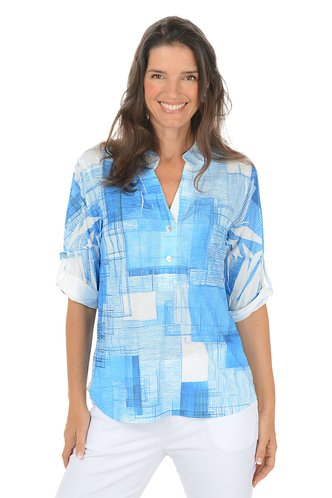 Woman wearing a blue abstract patterned shirt on a white background