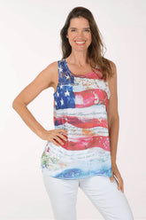 Woman wearing a sleeveless top with an American flag design on a white background
