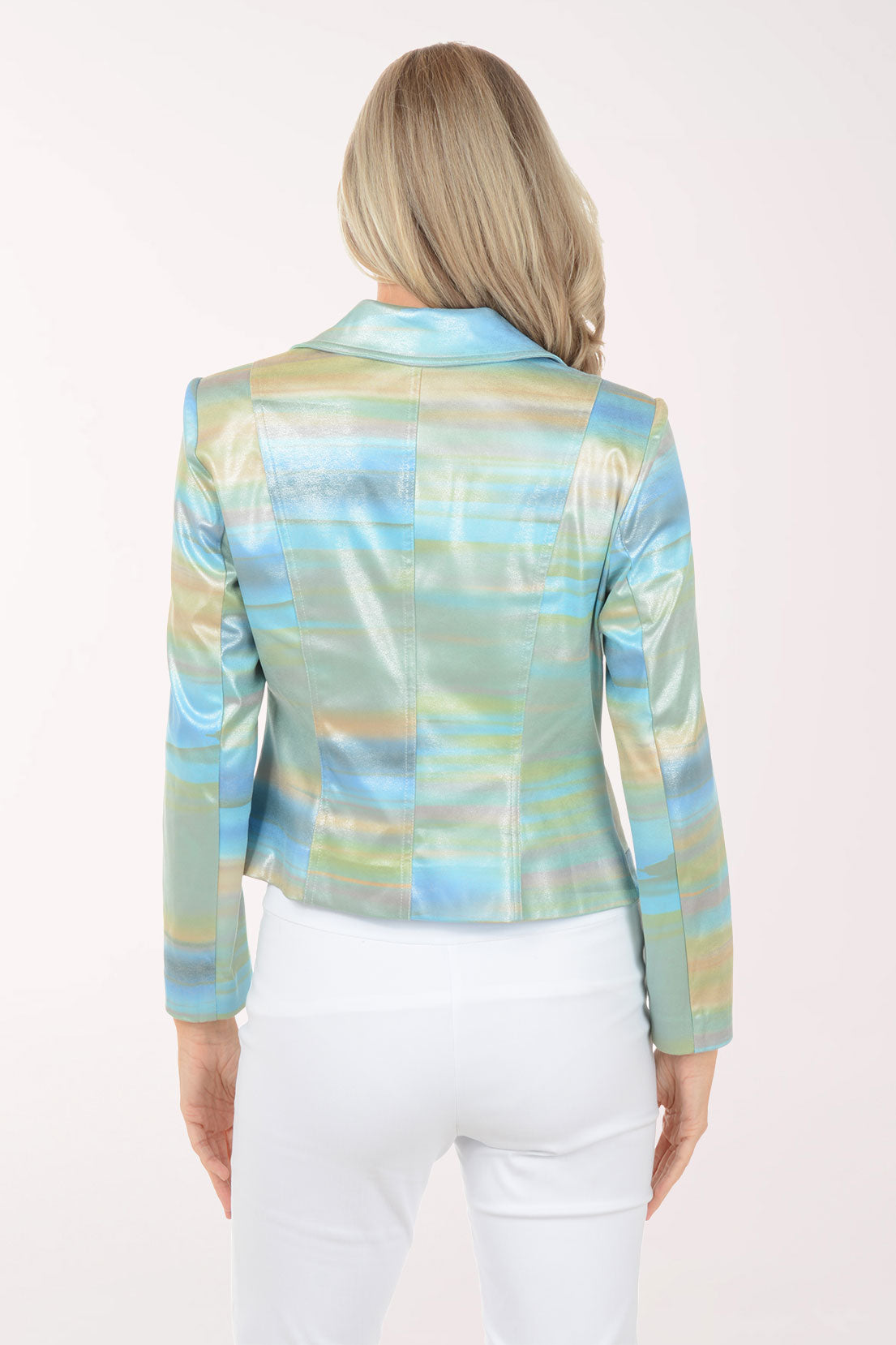 Woman wearing a colorful plaid jacket on a white background