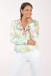 Woman wearing a colorful floral jacket on a white background